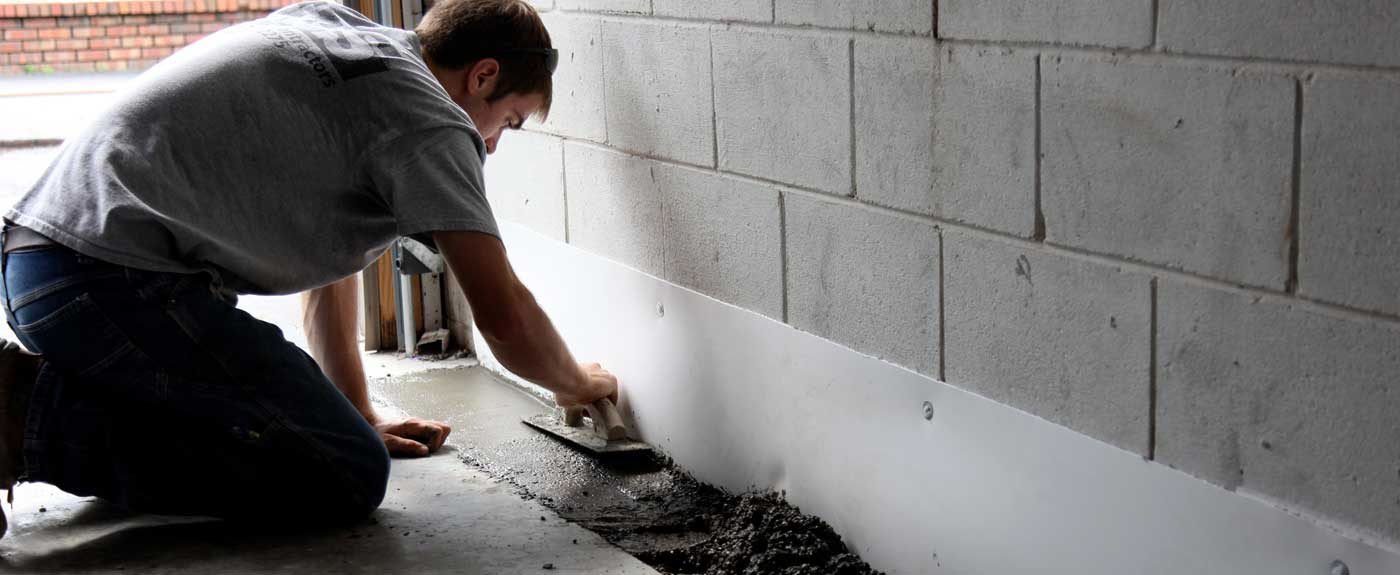 Basement waterproofing work in a New York home